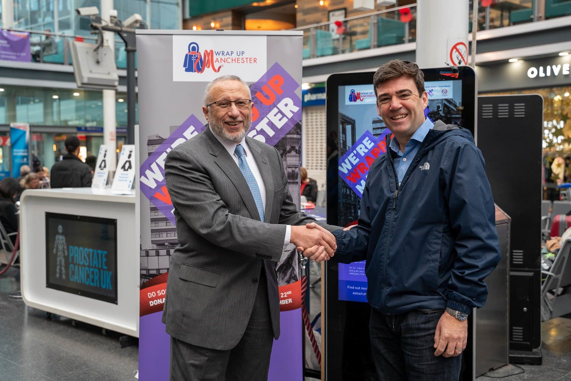 Andy Burnham (right), Mayor of Greater Manchester visits Human Appeal's UK annual winter coat collection campaign and meets with Human Appeal CEO Dr. Mohamed Ashmawey.